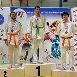 Champion de France de judo Universitaire en - 66kg ceinture de couleur Orange-Verte 2024